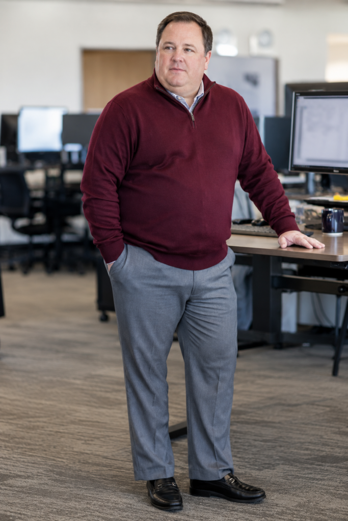 Burgundy Quarter-Zip Pullover With Straight-Leg Grey Trousers and Black Loafers
