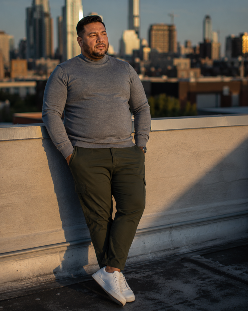 Fitted Grey Merino Mock-Neck With Dark Green Cargo-Style Trousers and Clean White Sneakers