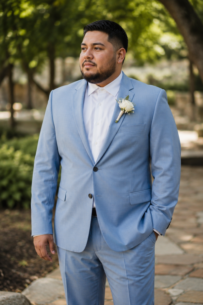 Light Blue Suit With a White Floral Boutonniere