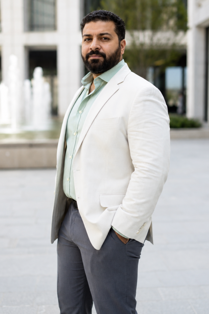 Mid-Grey Slim Trousers With a Fitted Mint Green Shirt and a White Unstructured Blazer