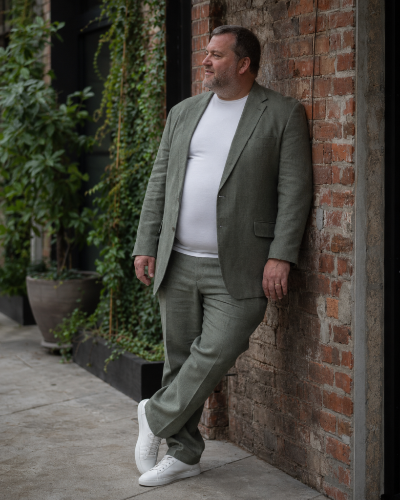 Sage Green Linen Suit With a White Crew Neck Tee and White Leather Trainers