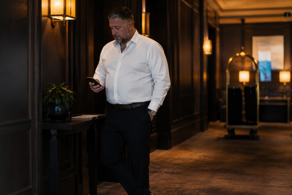 The Black Dress Trousers, Tucked Slim-Fit Dress Shirt, and Leather Belt Combination