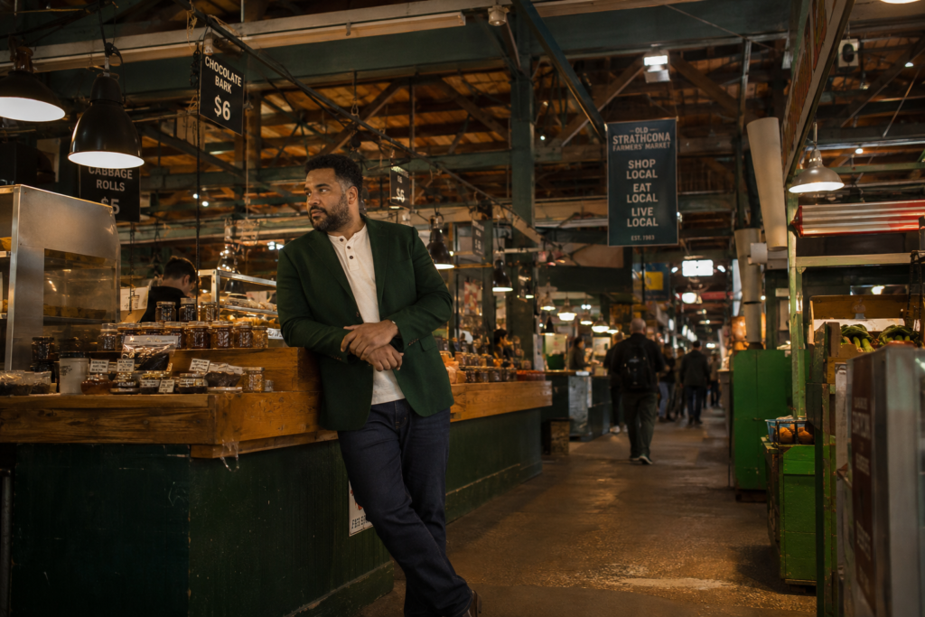 The Rust Blazer Over a Navy Crew Neck and Dark Straight Trousers