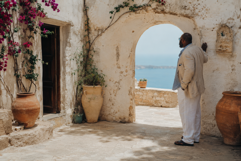 The Stone Linen Blazer Over a Striped Linen Shirt and White Relaxed Trousers