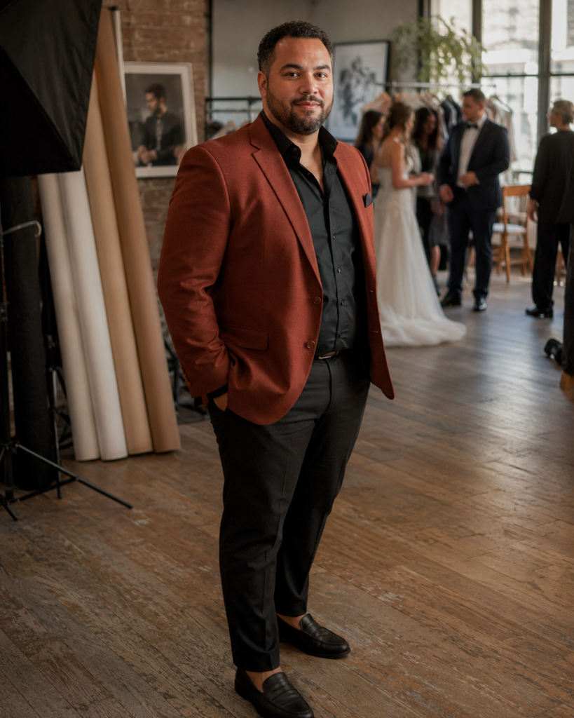Rust Tuxedo Jacket With an Open-Collar Black Shirt